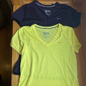 Two Nike Wonen’s Dri-FIT Tee Medium, purple and yellow